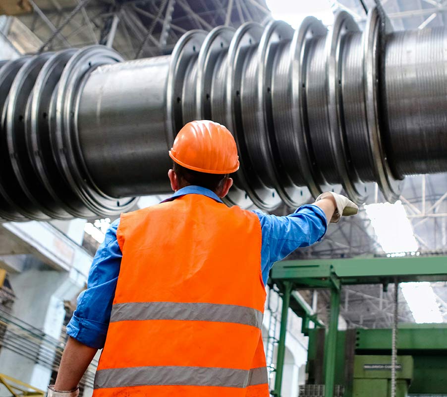 Avada Factory quality assurance matching internationl demands 2 Industrial Worker Inspecting Heavy Machinery